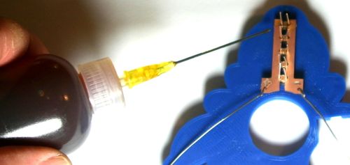 A few drops of rosin flux will make soldering far easier.